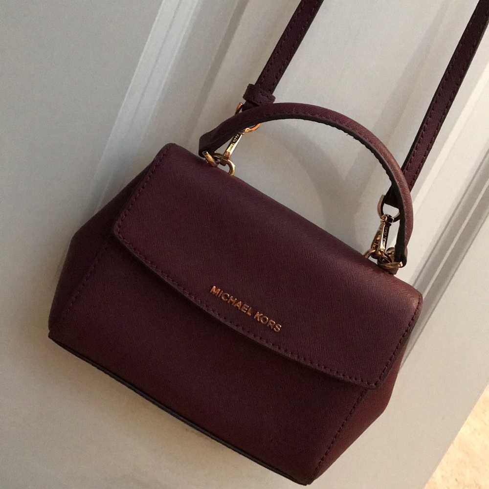 Michael kors burgundy small cross body purse